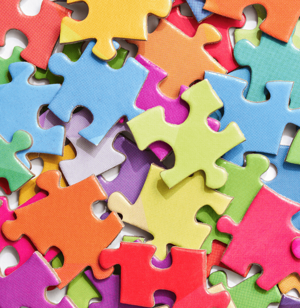 multi-coloured puzzle pieces lying flat